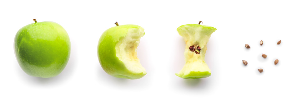 Apfelstrunk aufessen: Ein grüner Apfel wird nach und nach aufgegessen